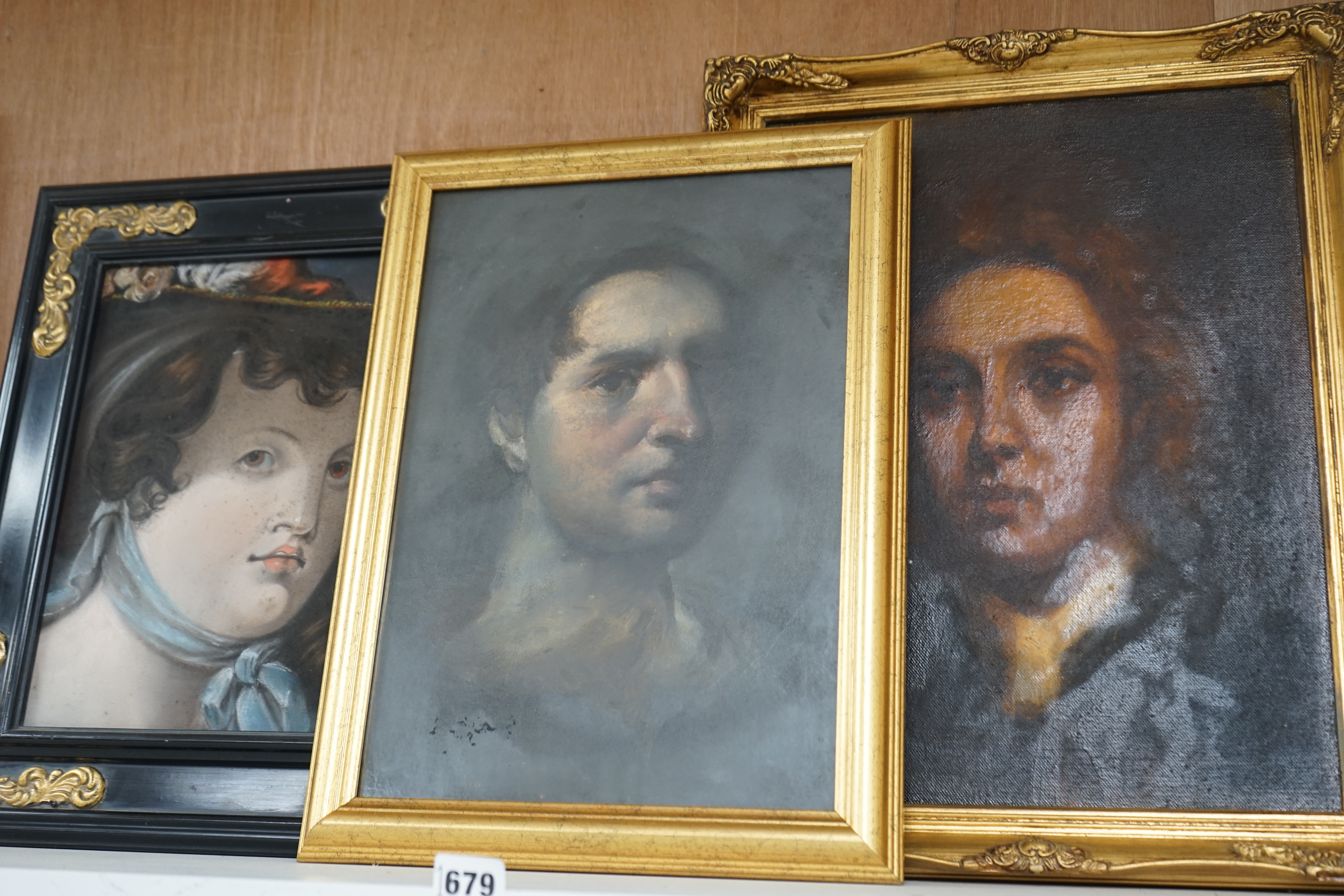 Three portraits to include a pastel, Portrait of a lady wearing a bonnet and an oil on canvas board, Portrait of a Georgian gentleman, 39 x 29cm, gilt framed. Condition - varies, fair to good